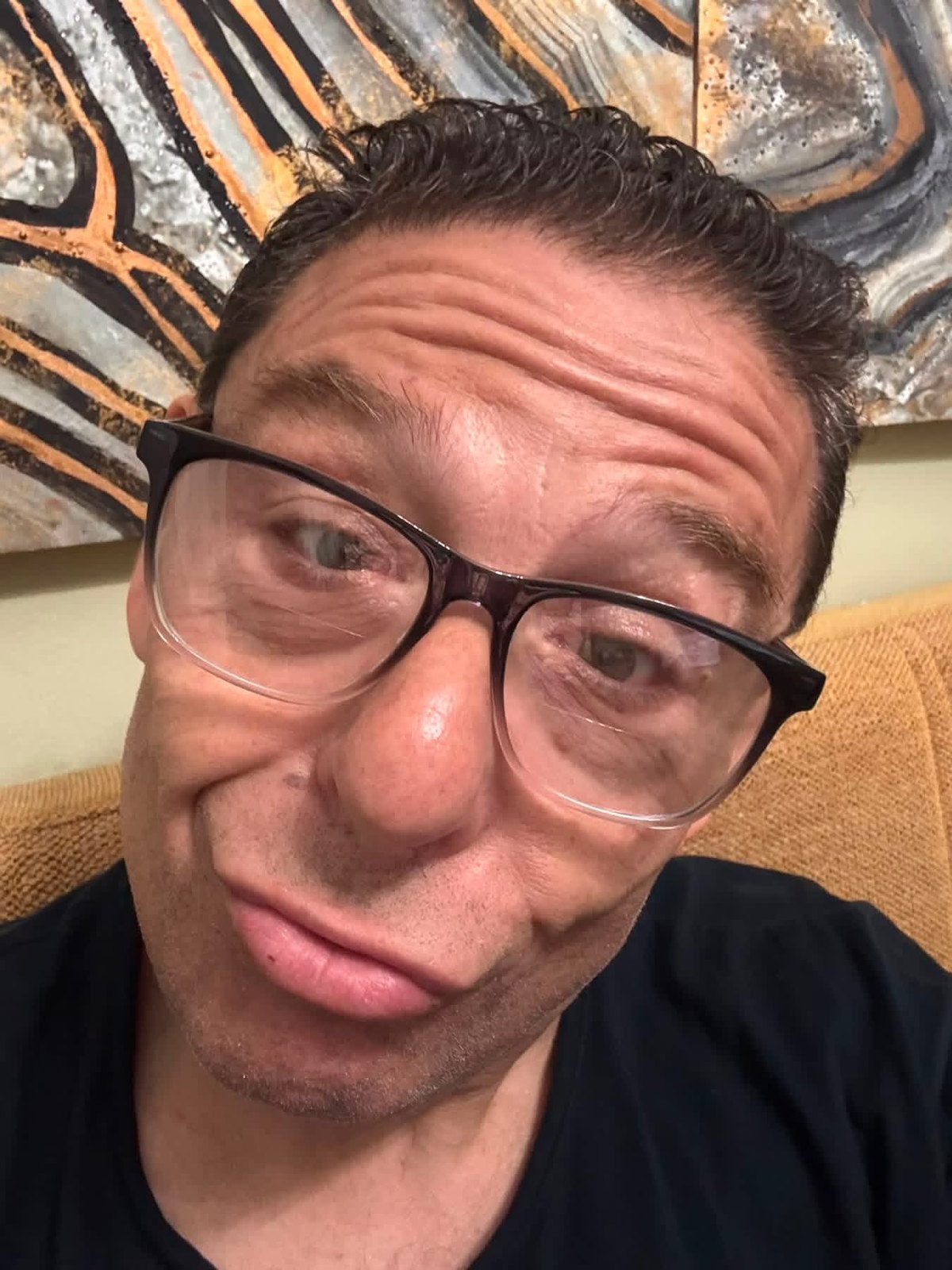 Greg Kritikos making a comic expression